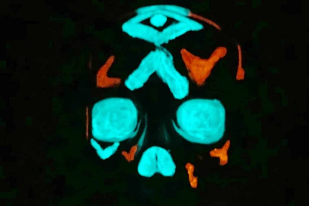 A plastic glowing after applying glow in the dark paint