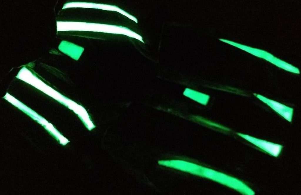 A metal glowing in the dark after using glow in the dark paint for metal